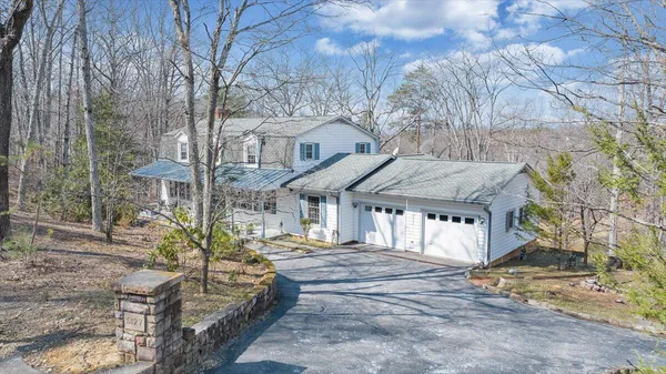 a house with trees in front of it