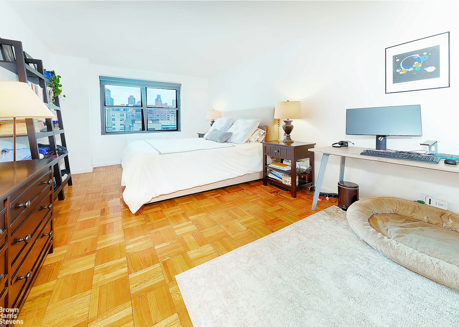 200 East 27th Street, Unit 11L Manhattan, NY 10016 - Photo 14 of 24 a bedroom with a bed and dresser