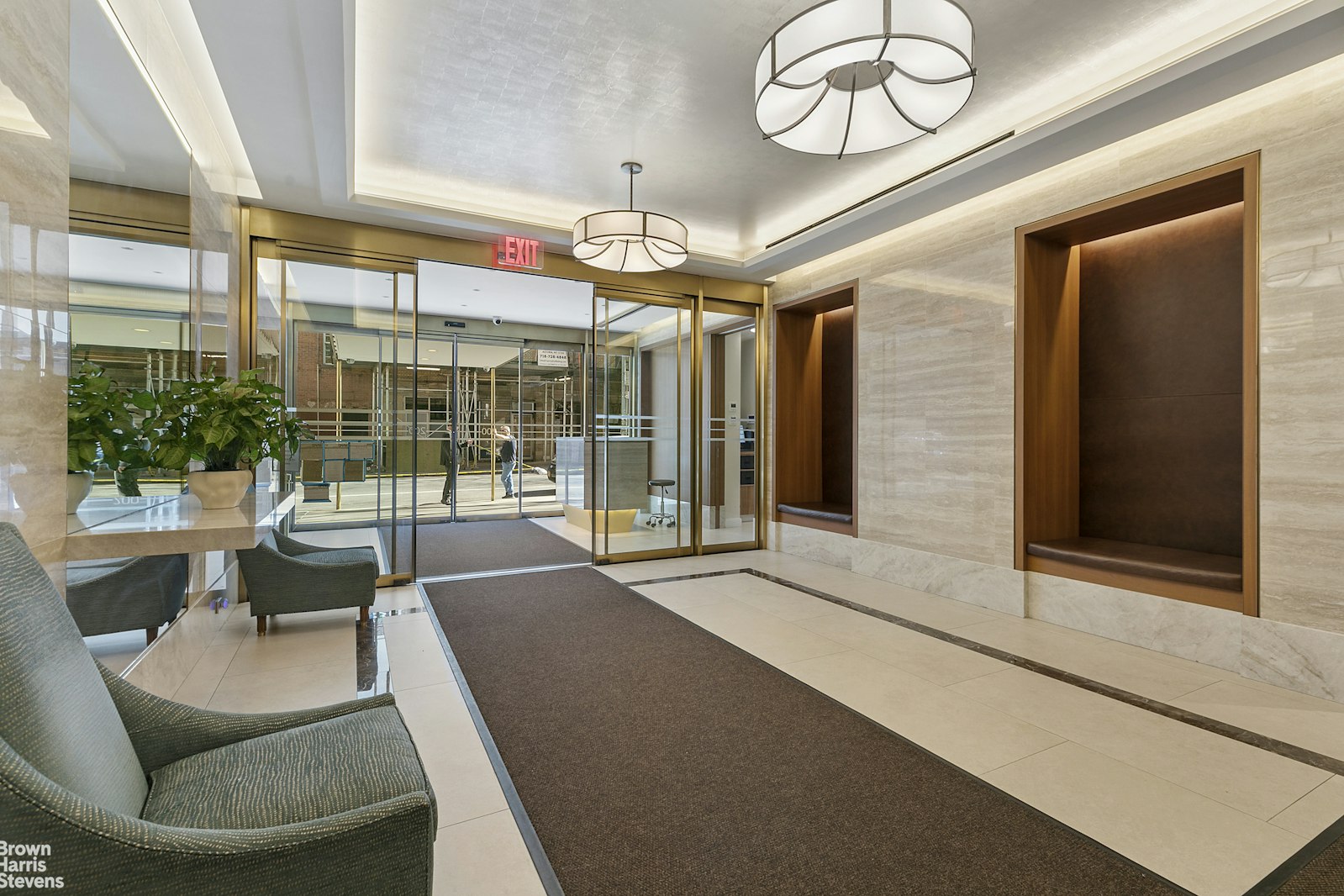 200 East 27th Street, Unit 11L Manhattan, NY 10016 - Photo 16 of 24 a very nice looking living room with a large window and chandelier
