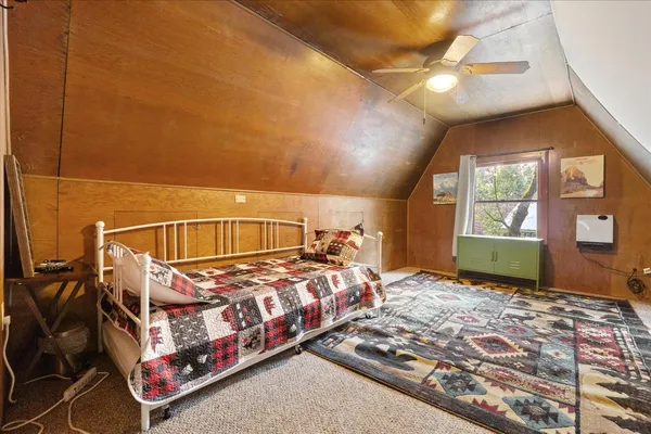 a view of a chairs and tables in the outdoor space