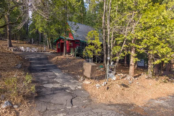 a kitchen with stainless steel appliances a refrigerator and a stove