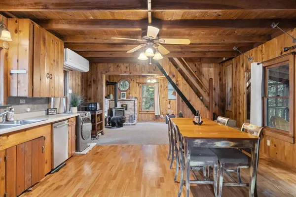 a view of a kitchen with washer and dryer
