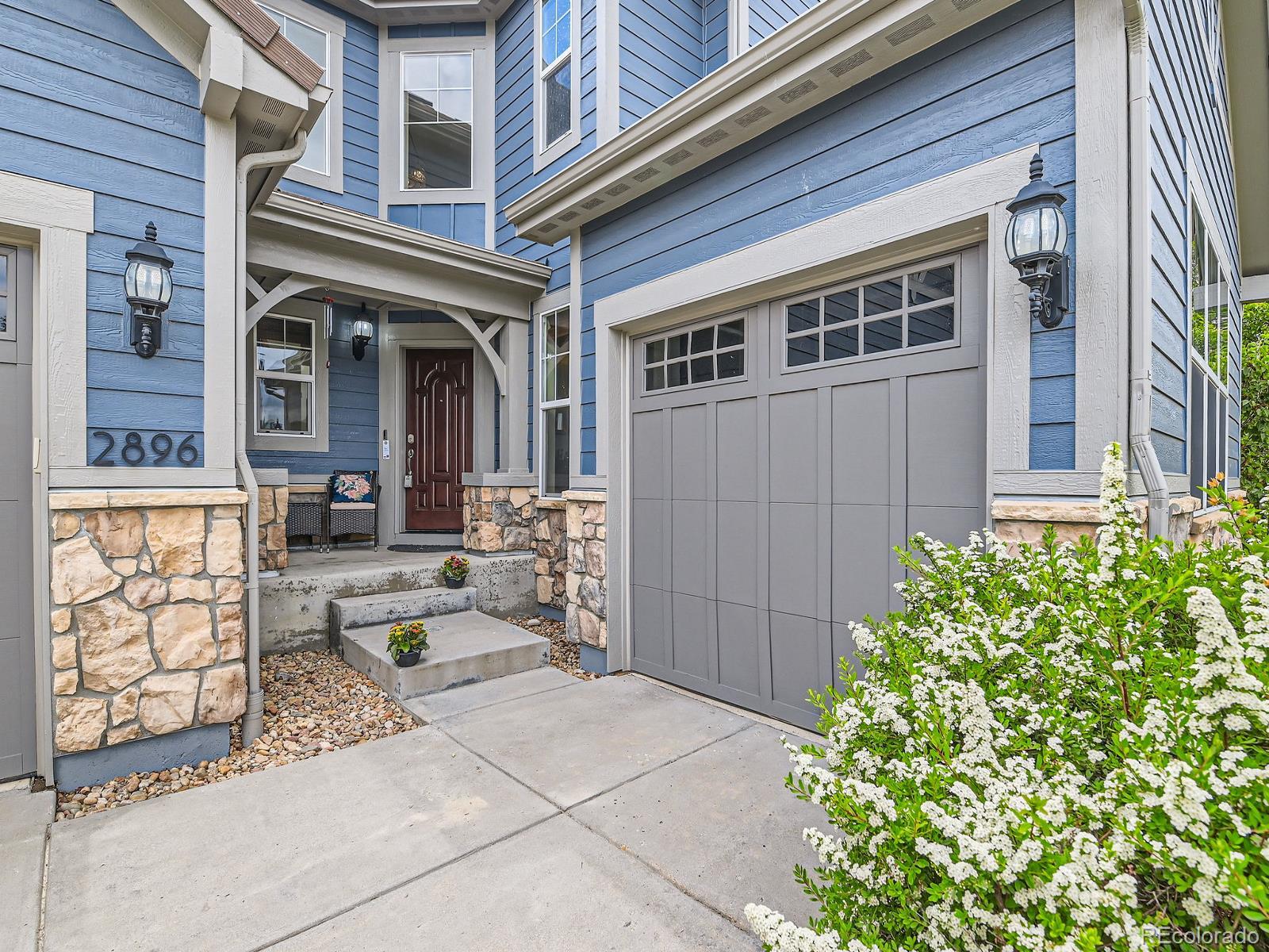 2896 Gemini Loop Broomfield, CO 80023 - Photo 3 of 49 front view of a building