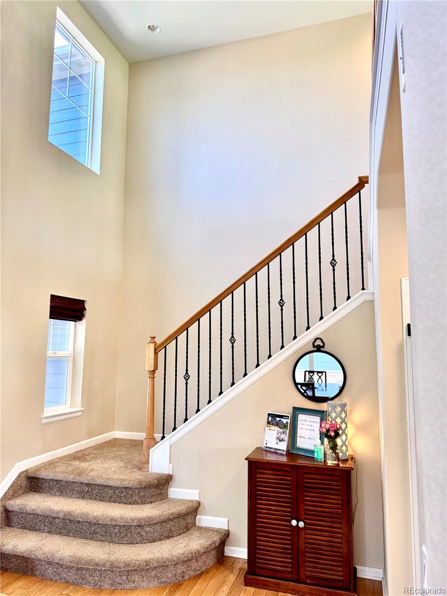 2896 Gemini Loop Broomfield, CO 80023 - Photo 4 of 49 a view of a hallway with furniture