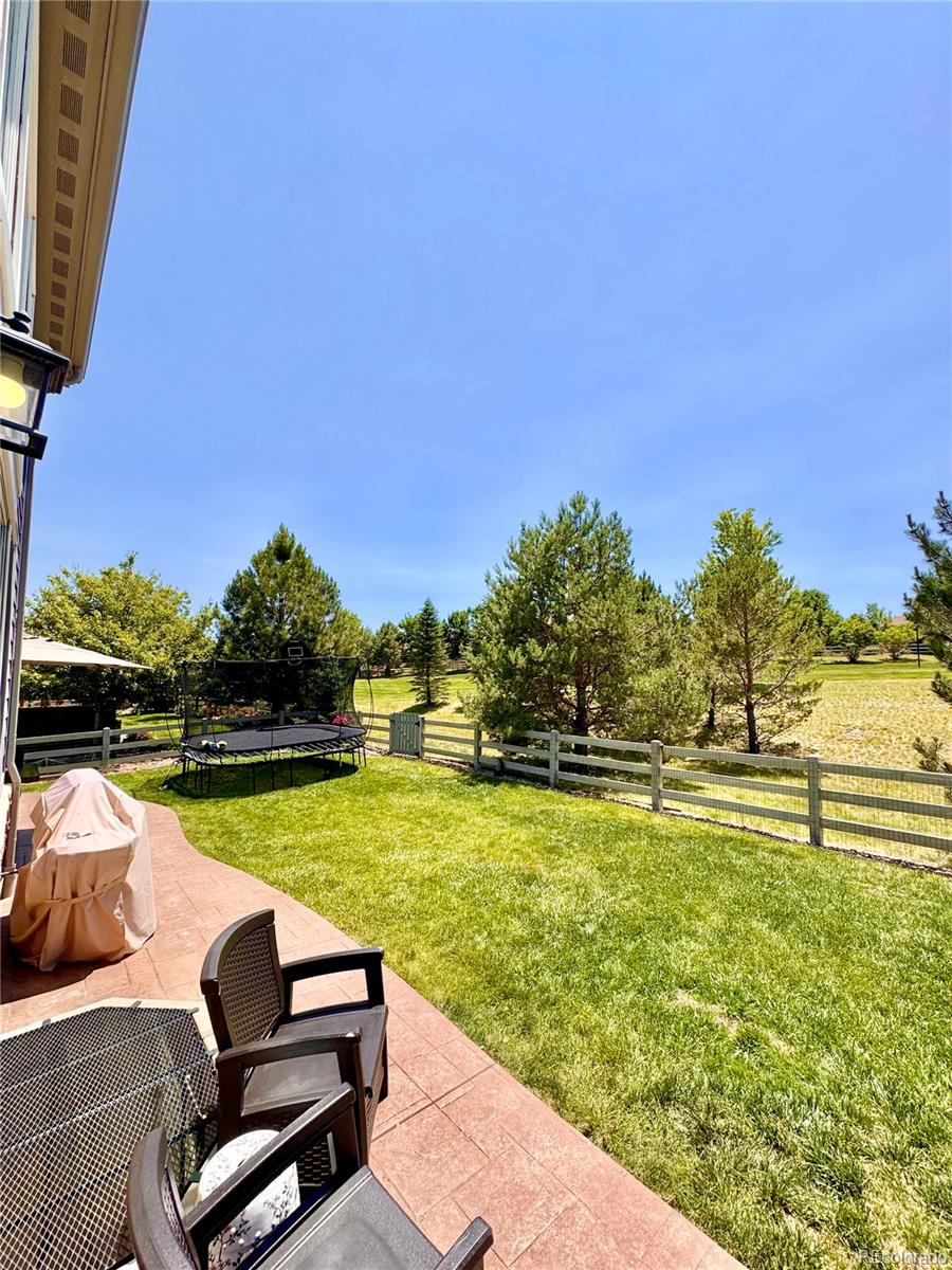 2896 Gemini Loop Broomfield, CO 80023 - Photo 45 of 49 a view of a swimming pool with lounge chairs