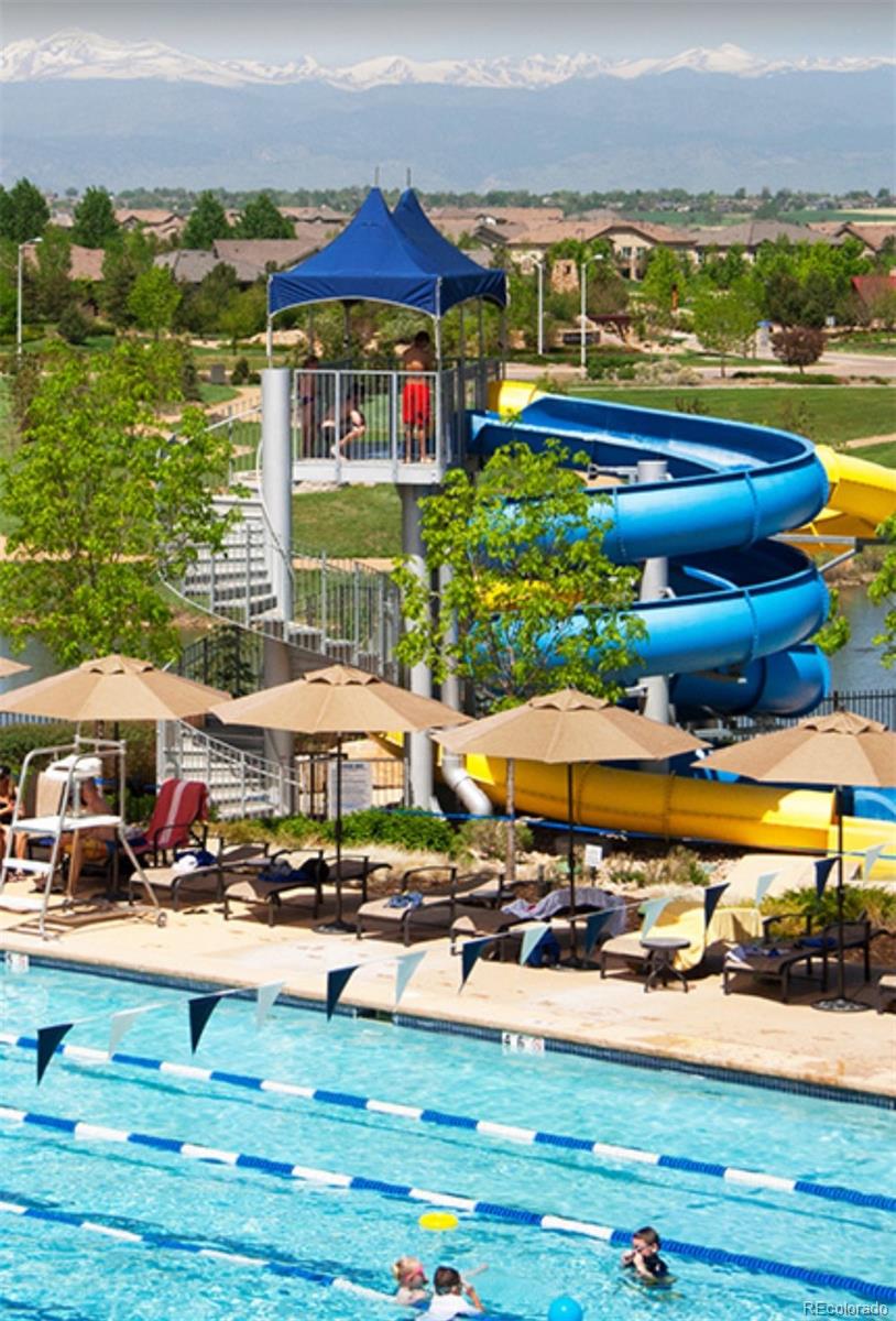 2896 Gemini Loop Broomfield, CO 80023 - Photo 49 of 49 a view of swimming pool with outdoor seating and yard