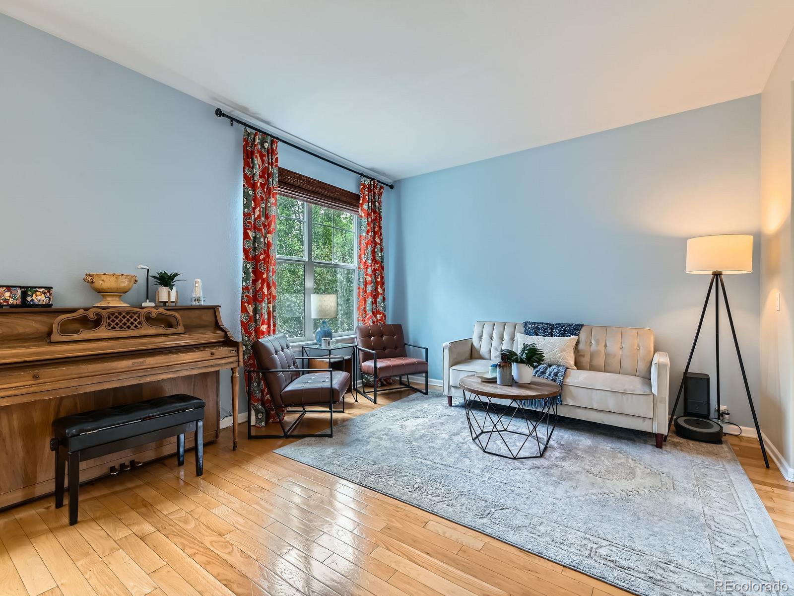 2896 Gemini Loop Broomfield, CO 80023 - Photo 8 of 49 a living room with furniture and a window