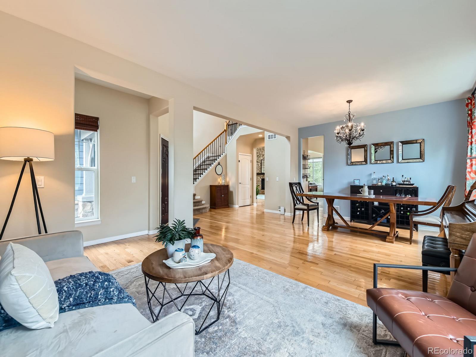 2896 Gemini Loop Broomfield, CO 80023 - Photo 9 of 49 a living room with furniture potted plant and a table