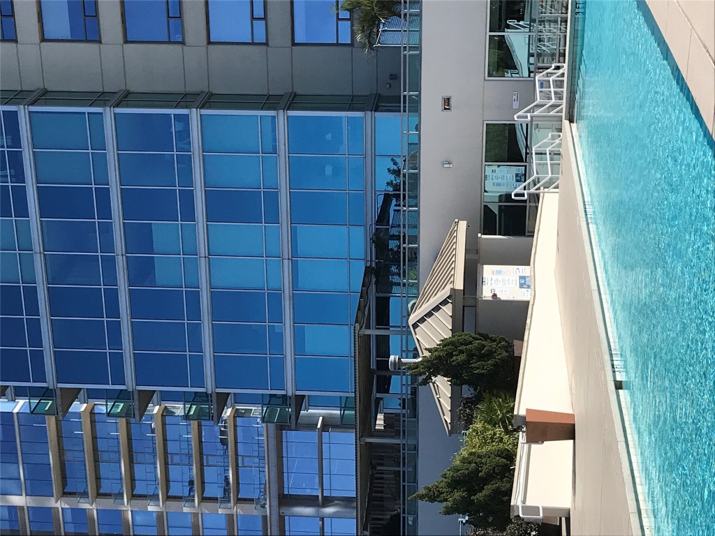 300 Bowie Street, Unit 1305 Austin, TX 78703 - Photo 35 of 38 a view of a house with a yard and sitting space