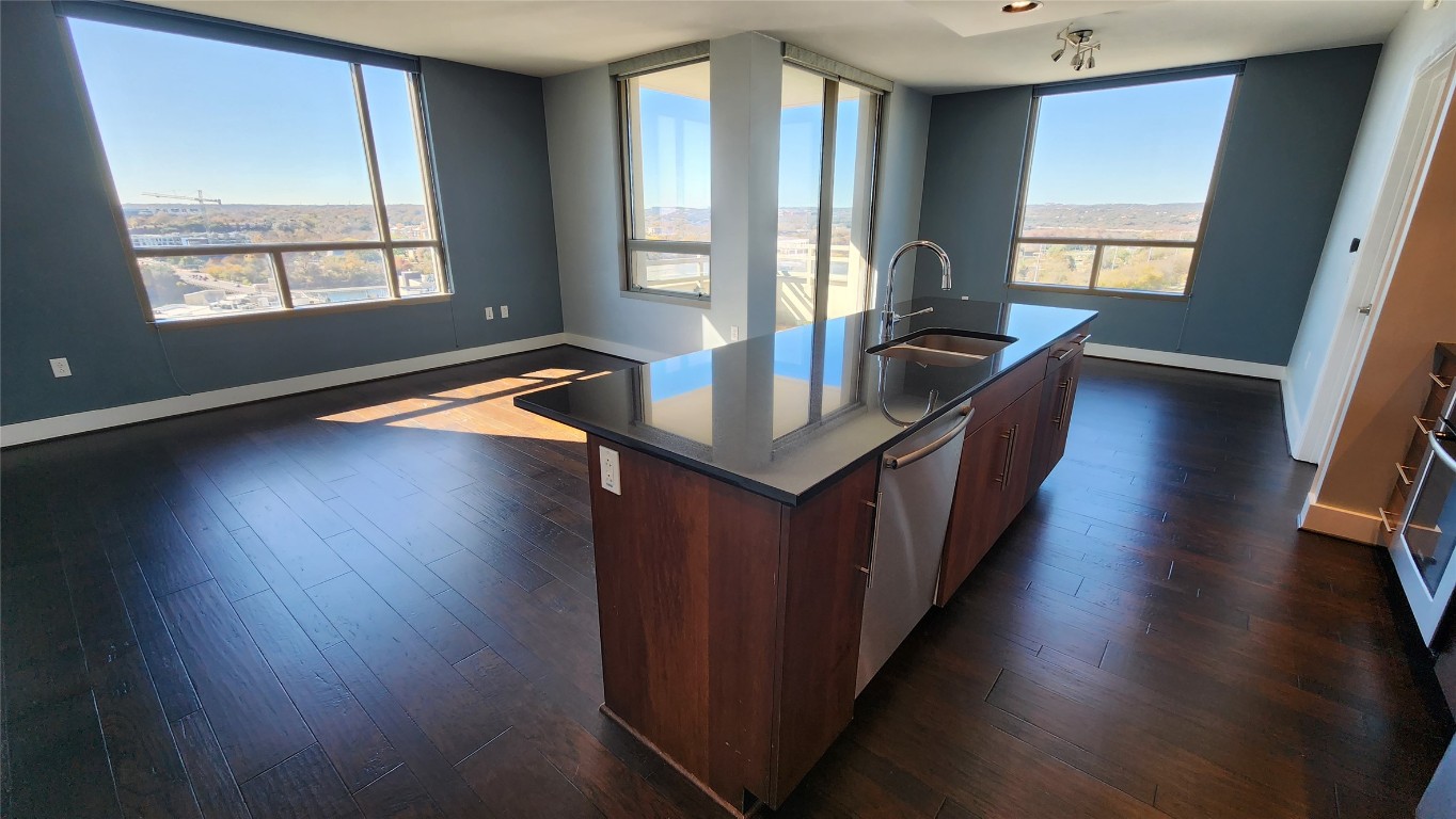 300 Bowie Street, Unit 1305 Austin, TX 78703 - Photo 37 of 38 wooden floor with a window in a living room