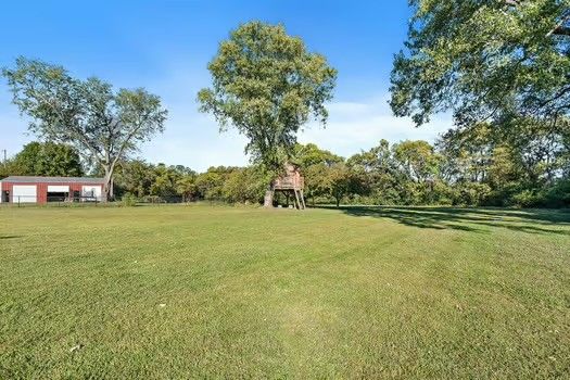 a view of outdoor space and yard