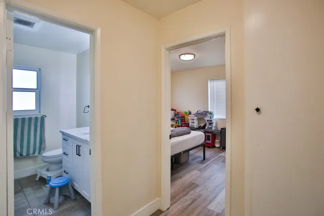 a view of a bathroom from the hallway