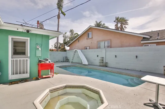 swimming pool view with a outdoor space