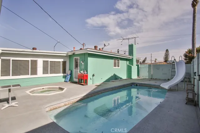 a view of a house with a swimming pool