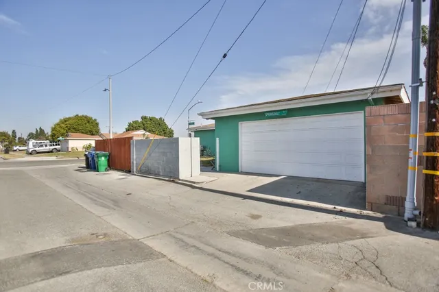 a front view of a house with garage