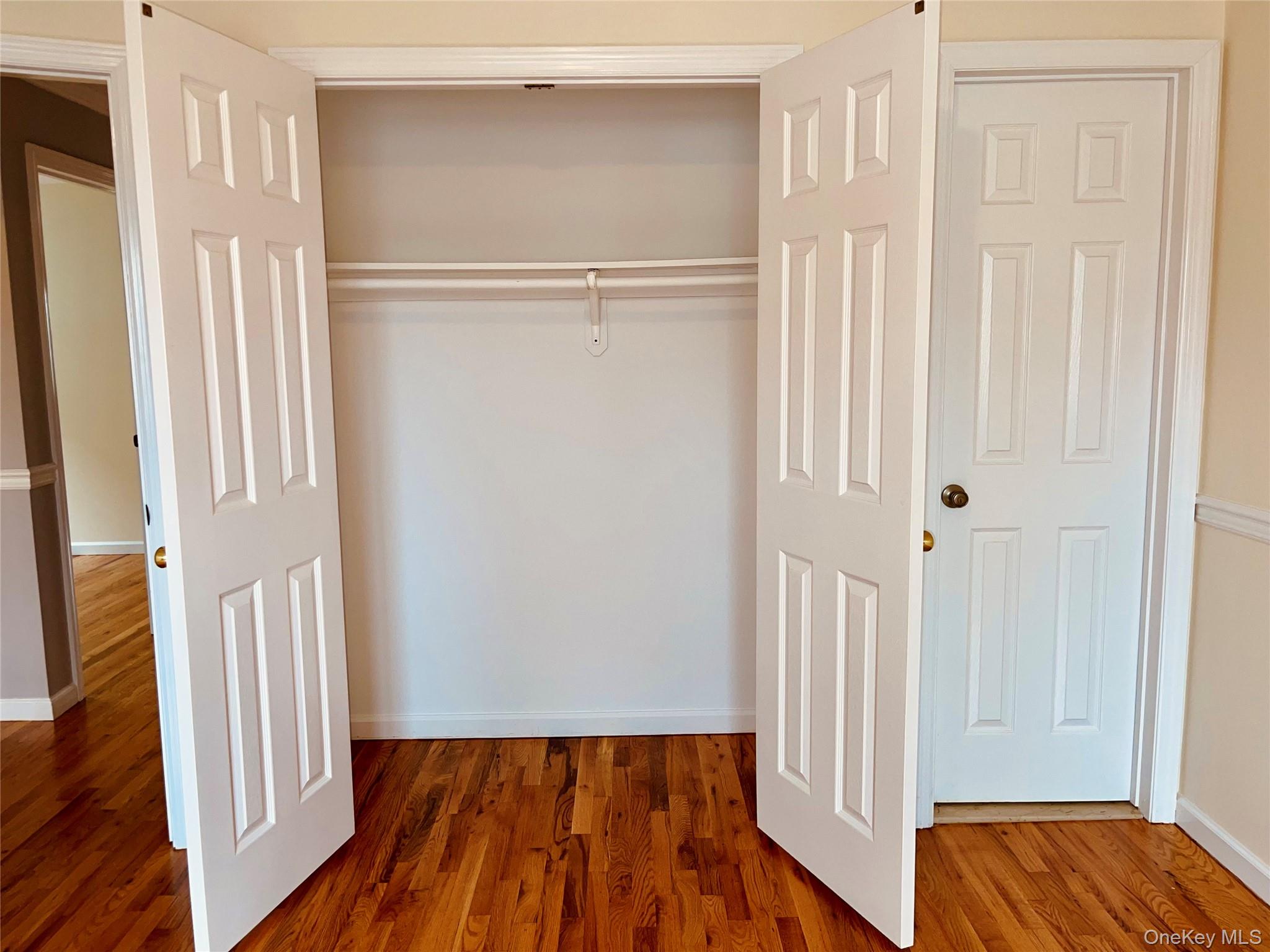 Undisclosed Address Queens, NY 11361 - Photo 5 of 8 a view of front door with wooden floor