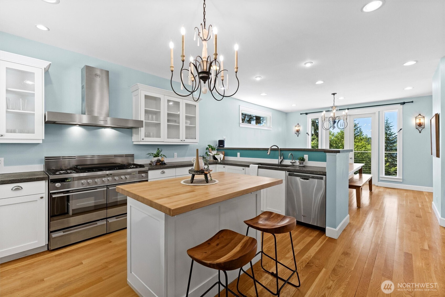 89 Grand View Lane Bellingham, WA 98229 - Photo 13 of 40 a kitchen with a table chairs stove and cabinets