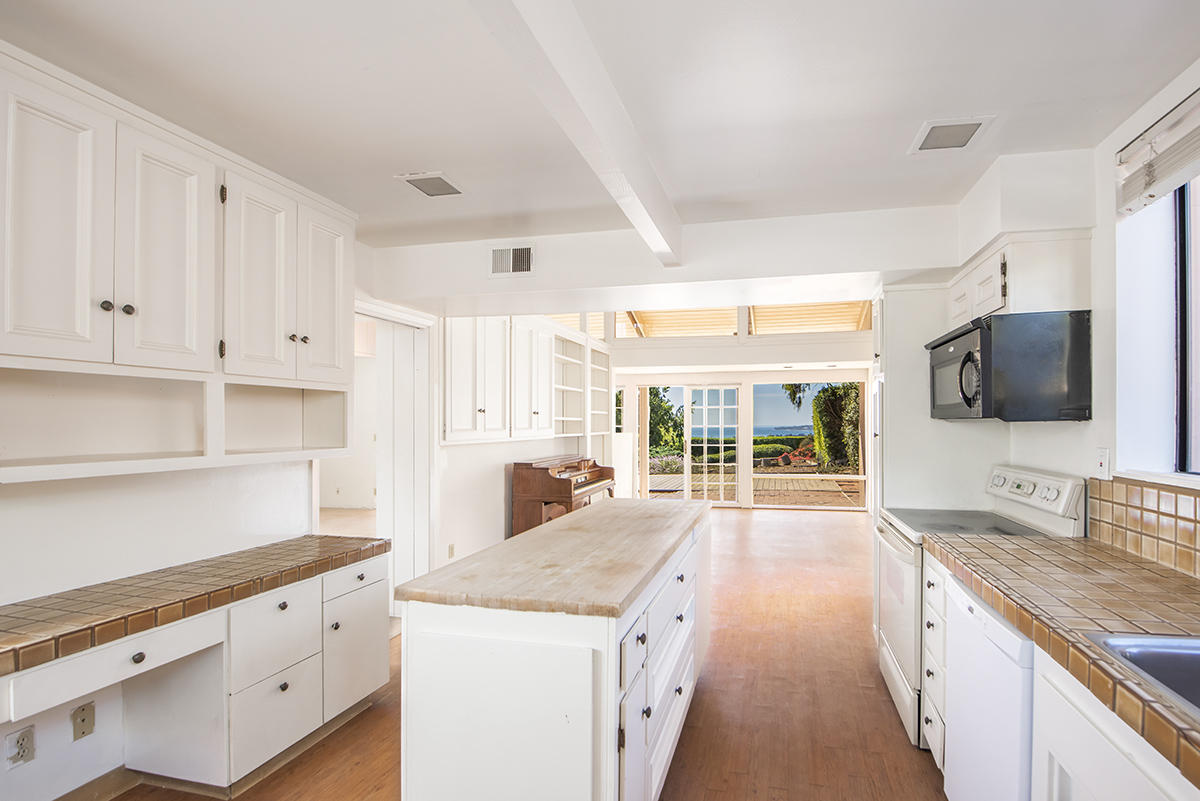 347 Ridgecrest Drive Montecito, CA 93108 - Photo 5 of 10 a open kitchen with granite countertop a sink and a stove top oven