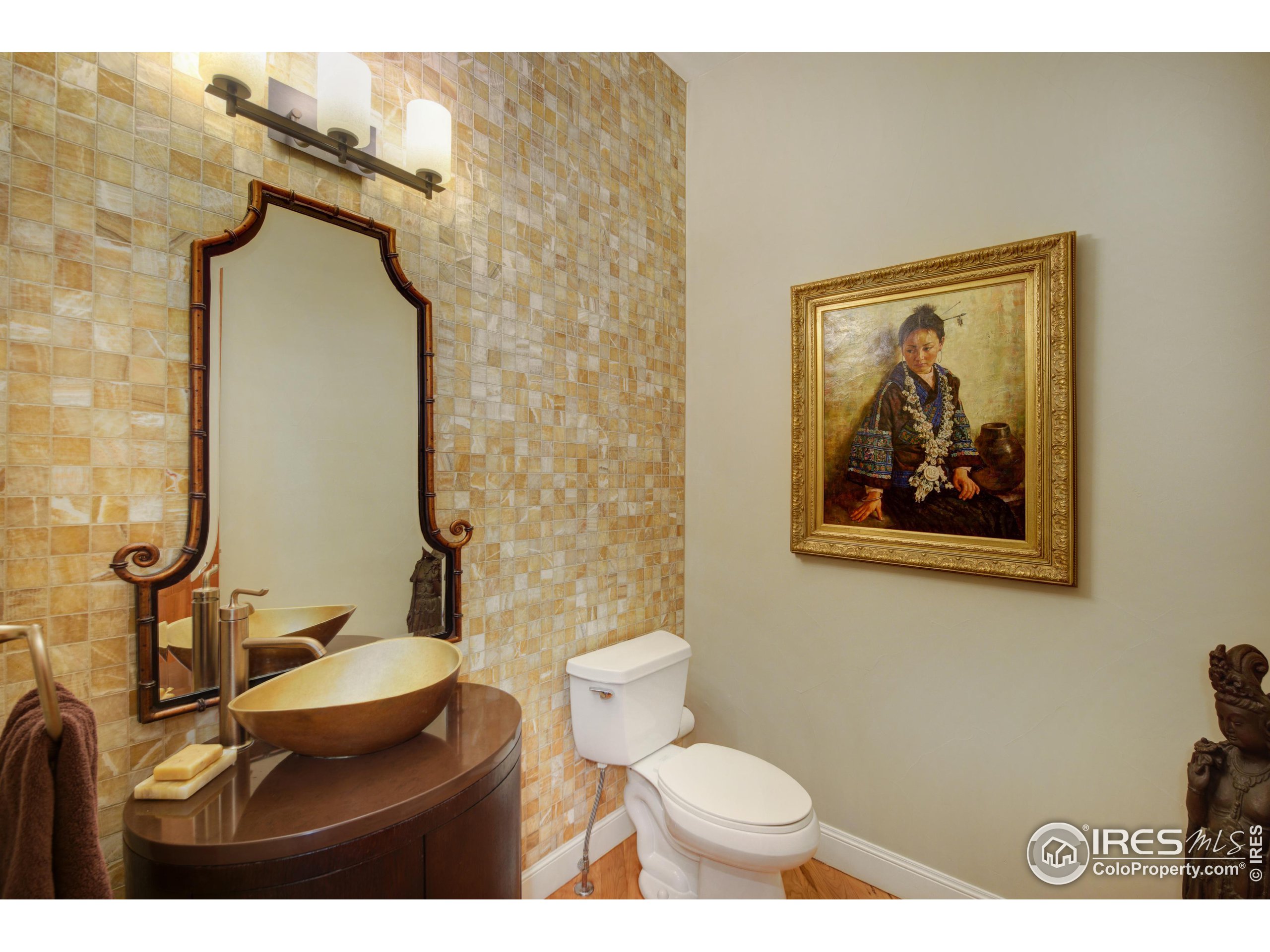75 Alder Lane Boulder, CO 80304 - Photo 14 of 40 a bathroom with a toilet sink and mirror