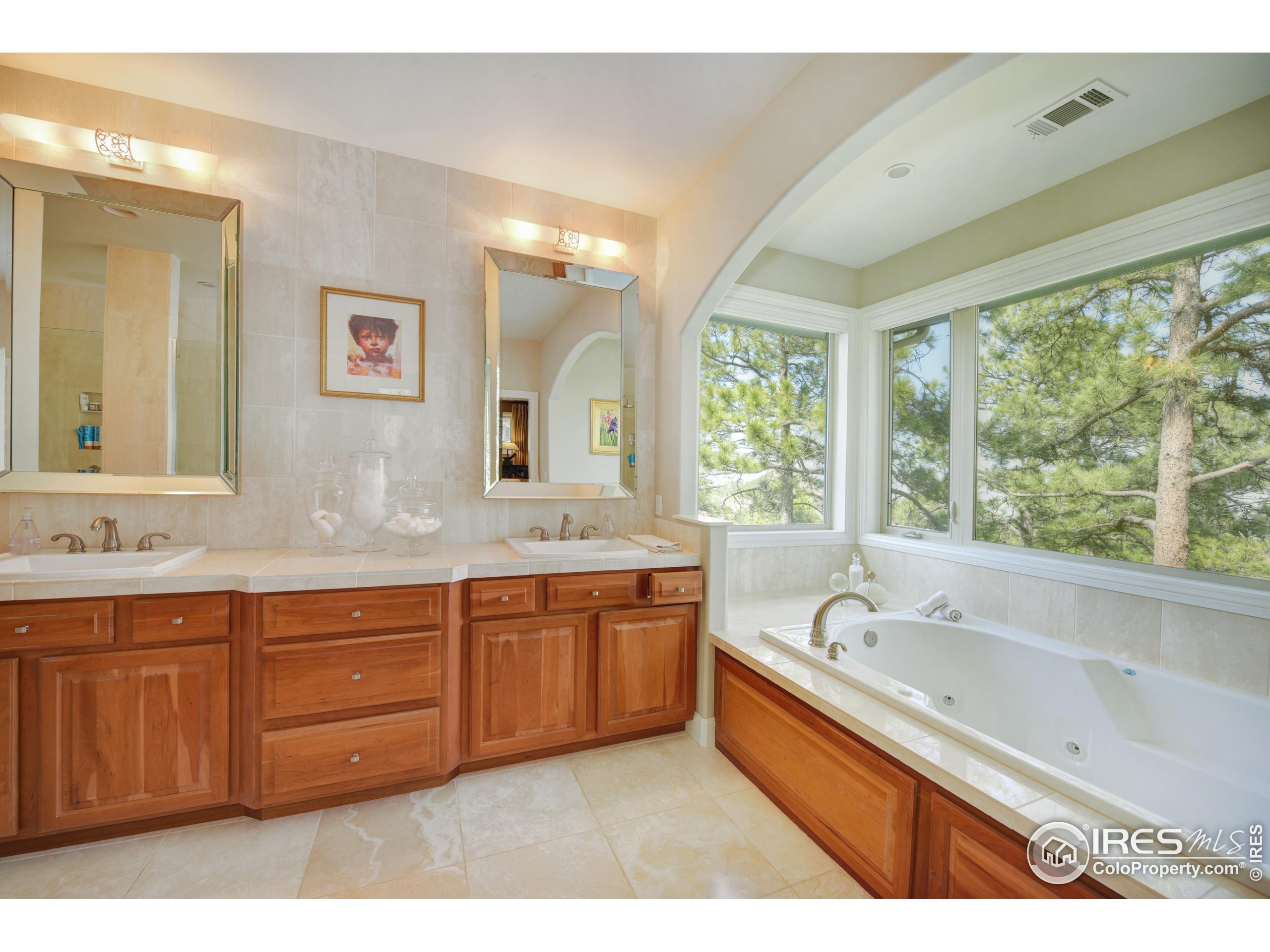 75 Alder Lane Boulder, CO 80304 - Photo 29 of 40 a large bathroom with a large tub and sink