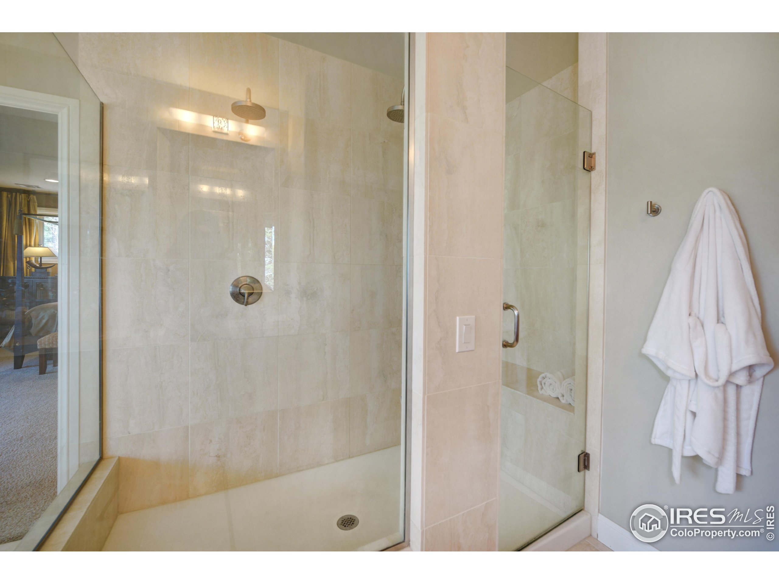 75 Alder Lane Boulder, CO 80304 - Photo 39 of 40 a bathroom with a shower and a sink