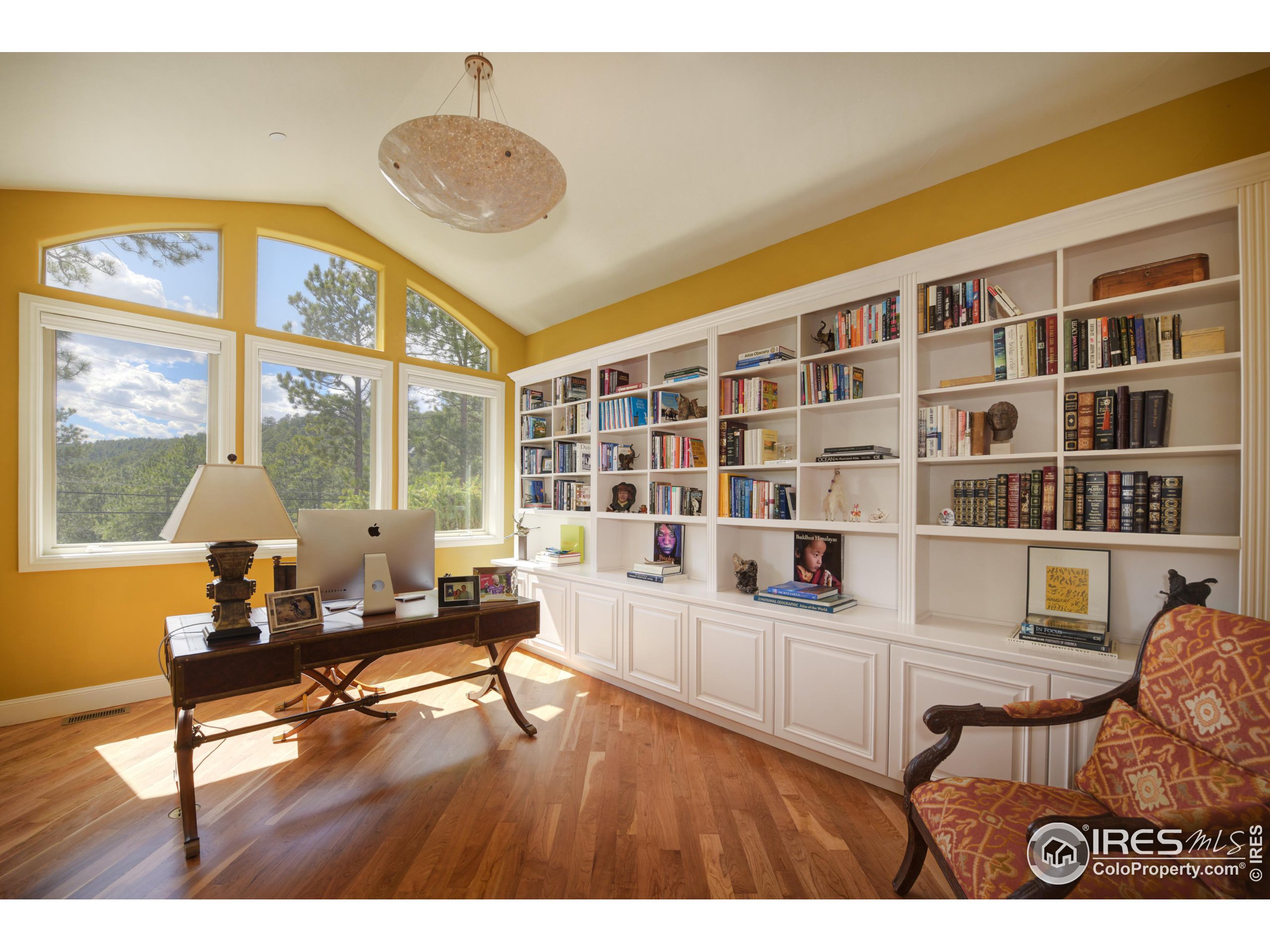75 Alder Lane Boulder, CO 80304 - Photo 5 of 40 a living room with furniture and floor to ceiling windows