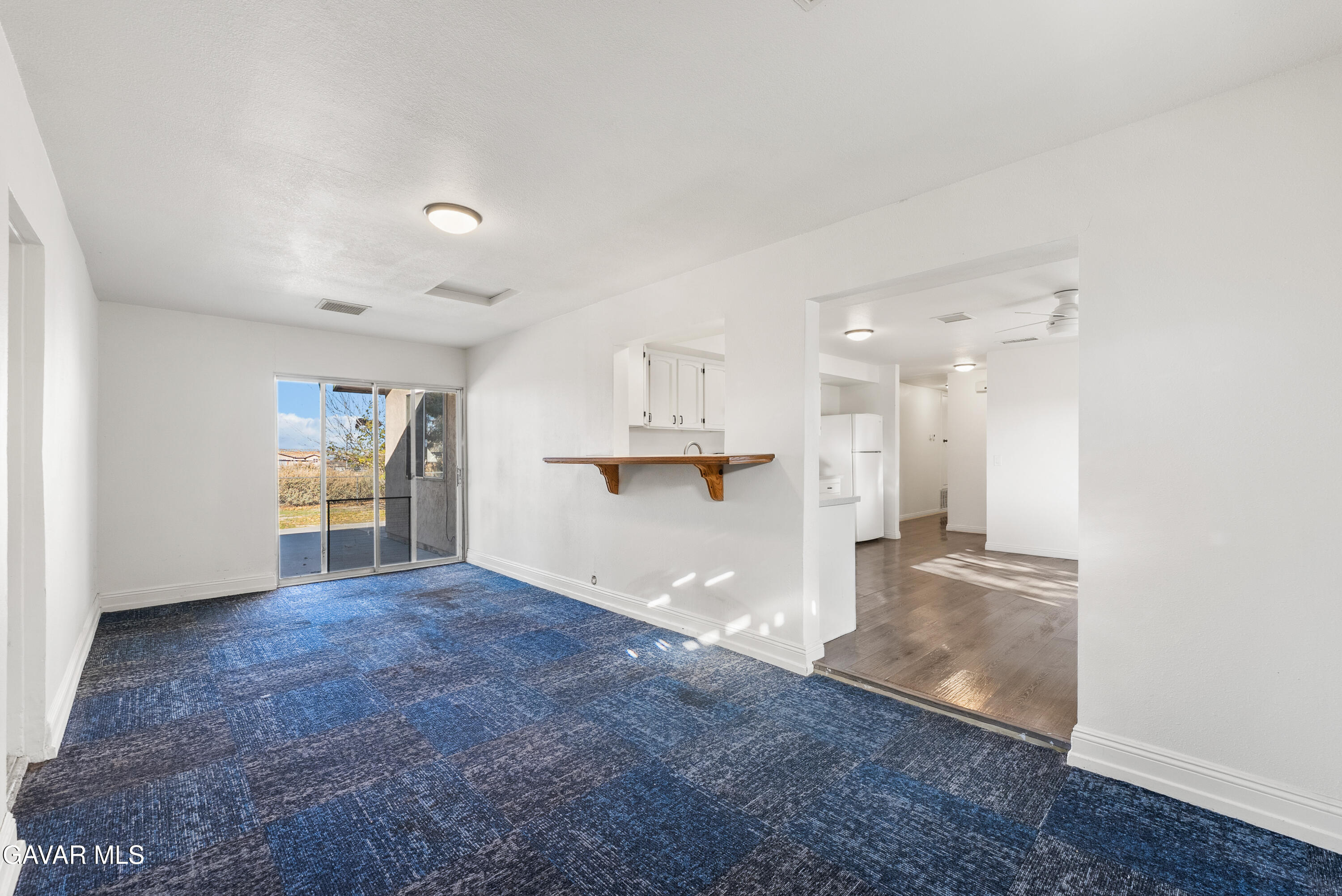 9459 East Ave T 2 Littlerock, CA 93543 - Photo 14 of 54 a view of a kitchen with a sink and a window