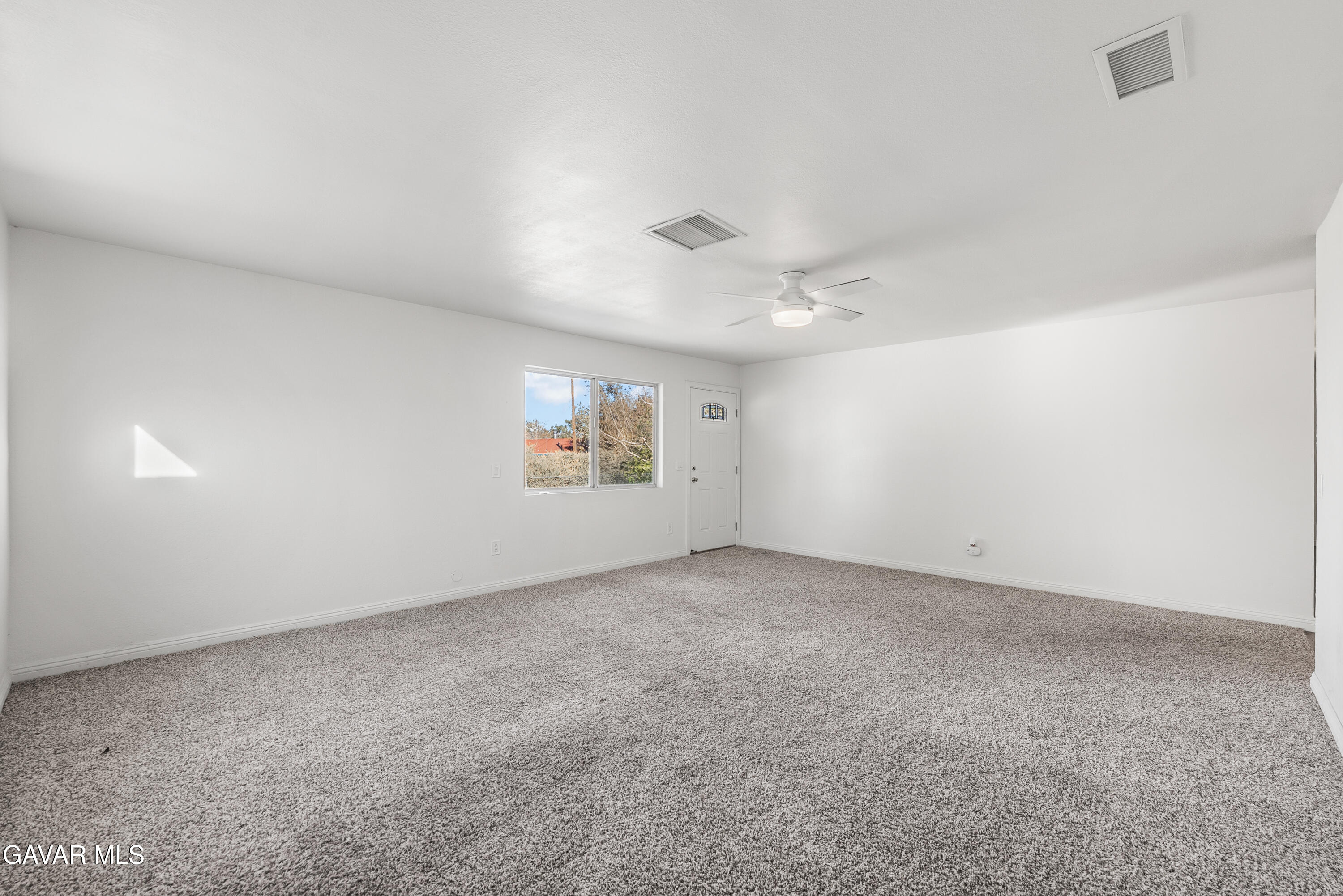 9459 East Ave T 2 Littlerock, CA 93543 - Photo 31 of 54 an empty room with windows