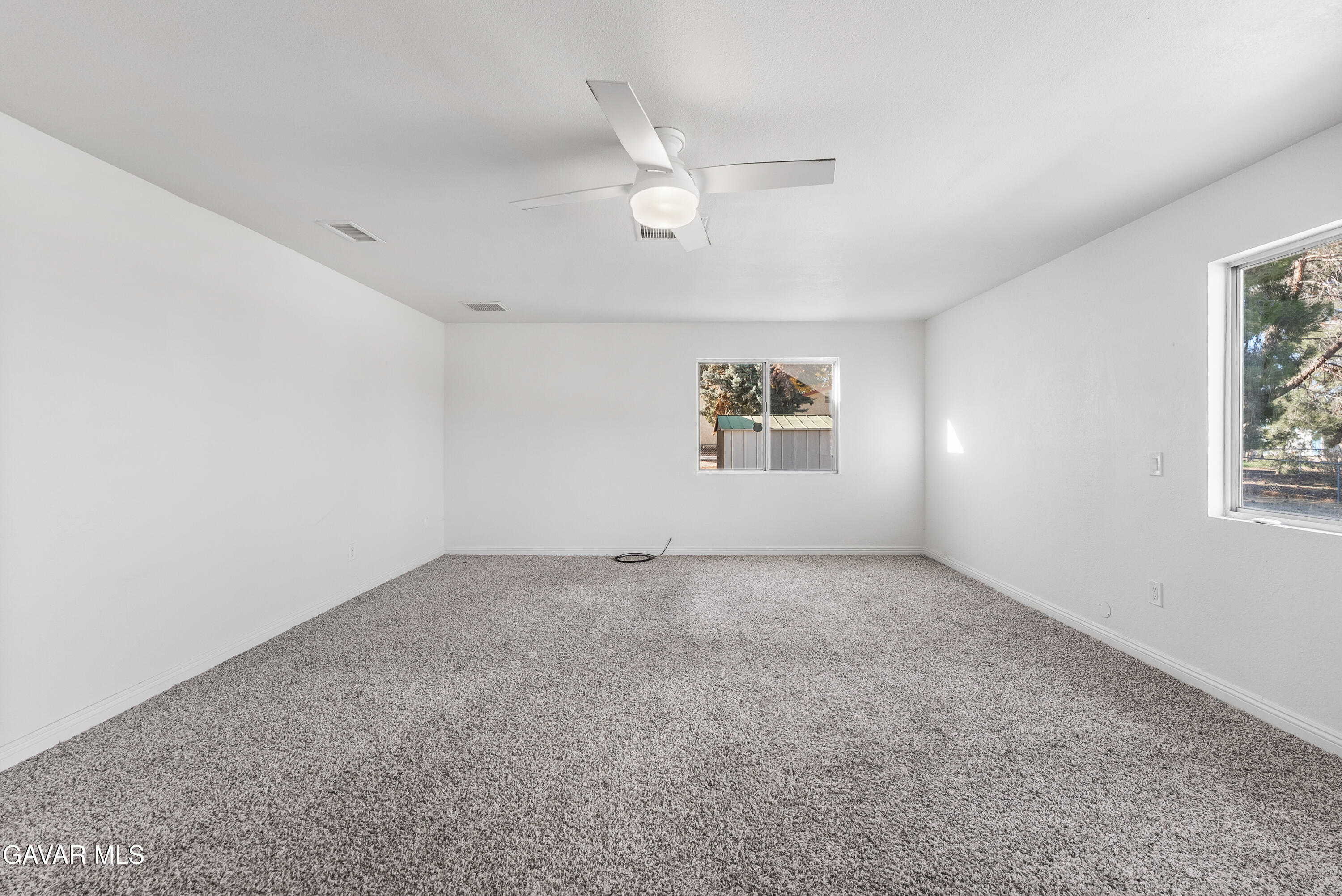 9459 East Ave T 2 Littlerock, CA 93543 - Photo 32 of 54 a view of an empty room with a window