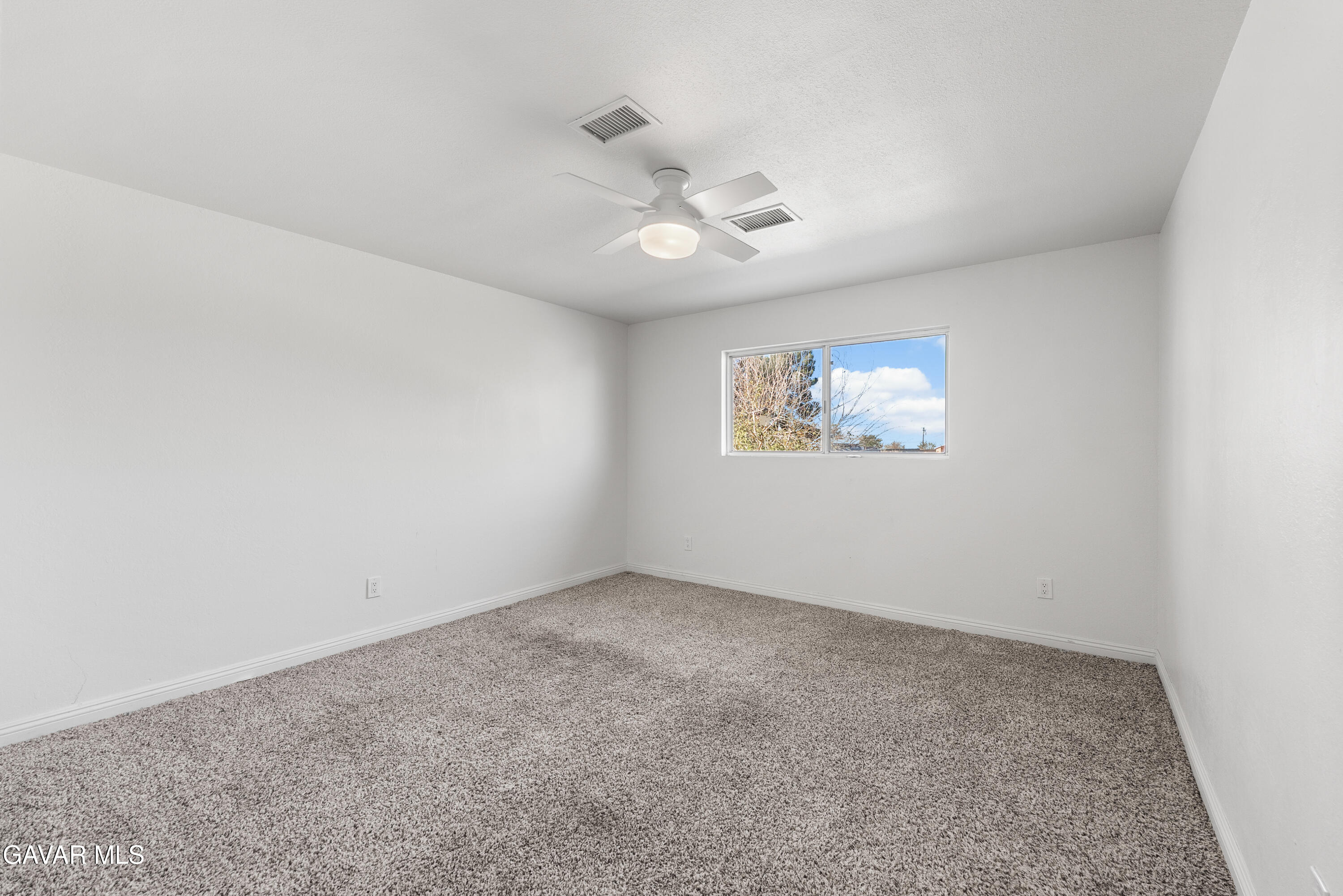 9459 East Ave T 2 Littlerock, CA 93543 - Photo 34 of 54 an empty room with a window