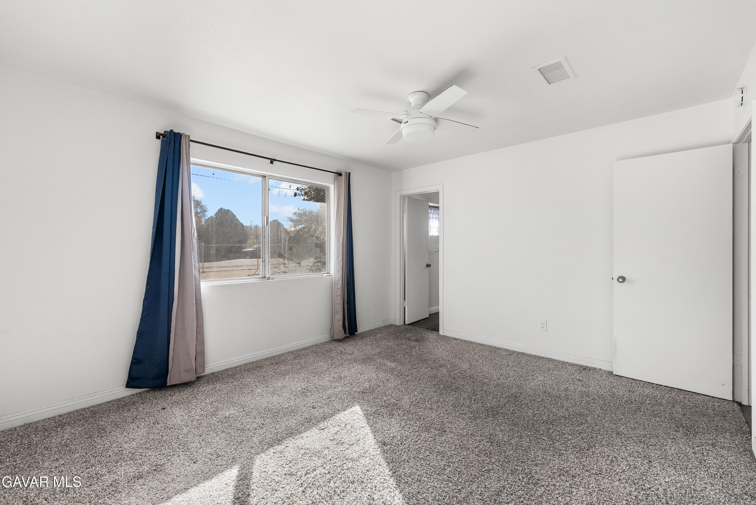 9459 East Ave T 2 Littlerock, CA 93543 - Photo 41 of 54 a view of an empty room with a window