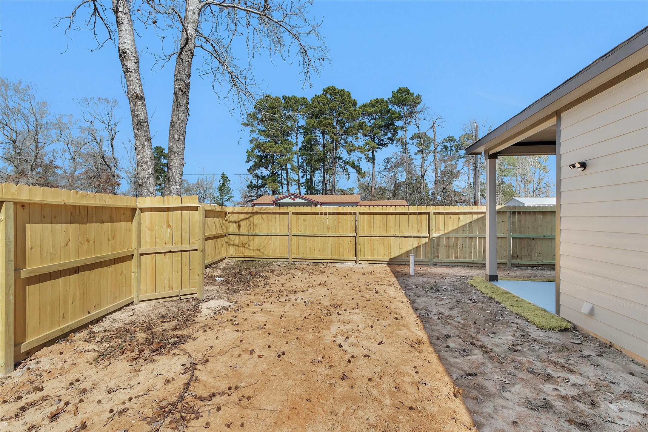 103 Canary St Point Point Blank, TX 77364 - Photo 27 of 28 a view of a backyard