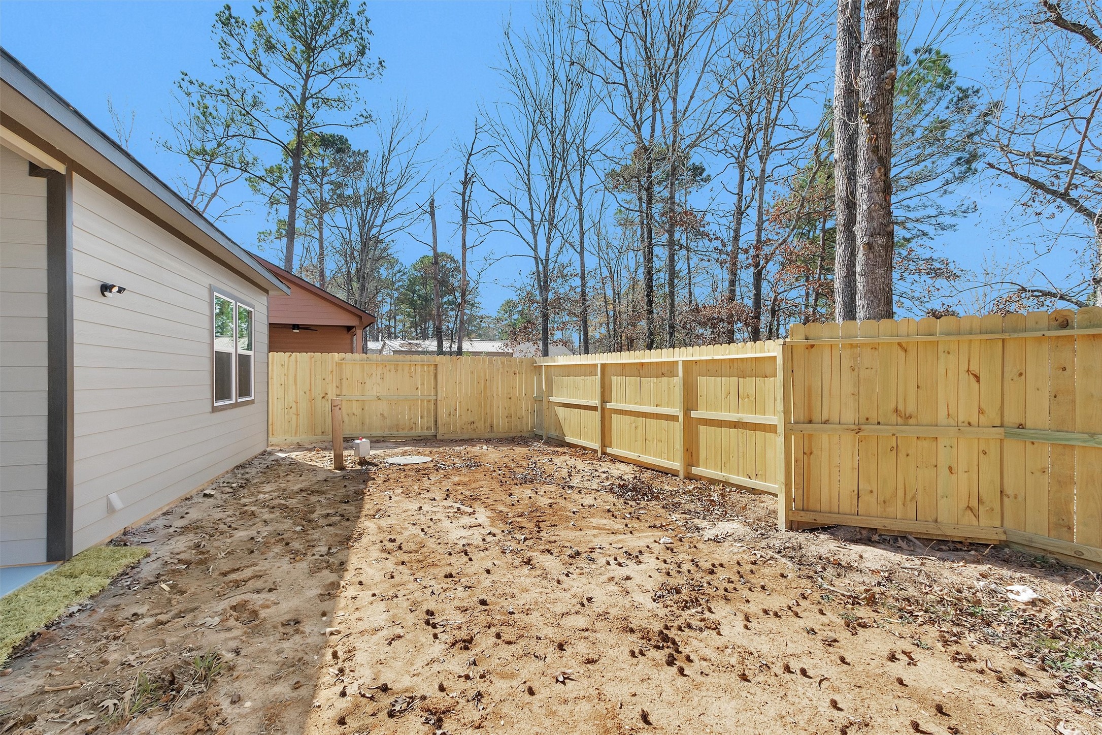 103 Canary St Point Point Blank, TX 77364 - Photo 28 of 28 a view of a backyard