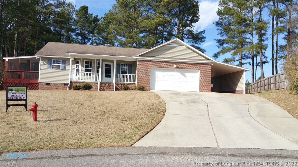 232 Rye Lane Raeford, NC 28376 - Photo 12 of 20 a view of a house with a yard