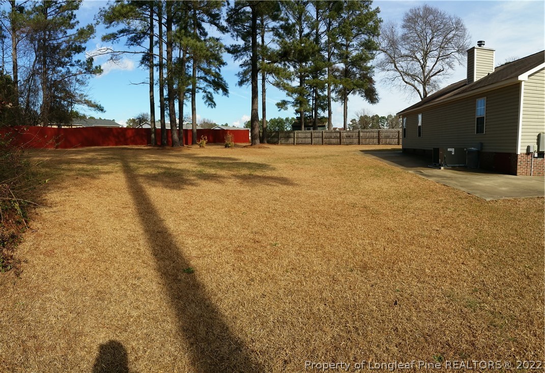 232 Rye Lane Raeford, NC 28376 - Photo 16 of 20 a view of road with large trees