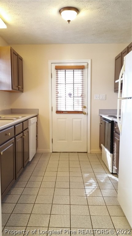 232 Rye Lane Raeford, NC 28376 - Photo 20 of 20 a view of a kitchen with a stove top oven cabinets and stainless steel appliances