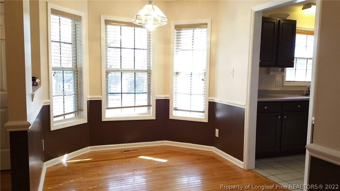 232 Rye Lane Raeford, NC 28376 - Photo 4 of 20 a view of an empty room and window