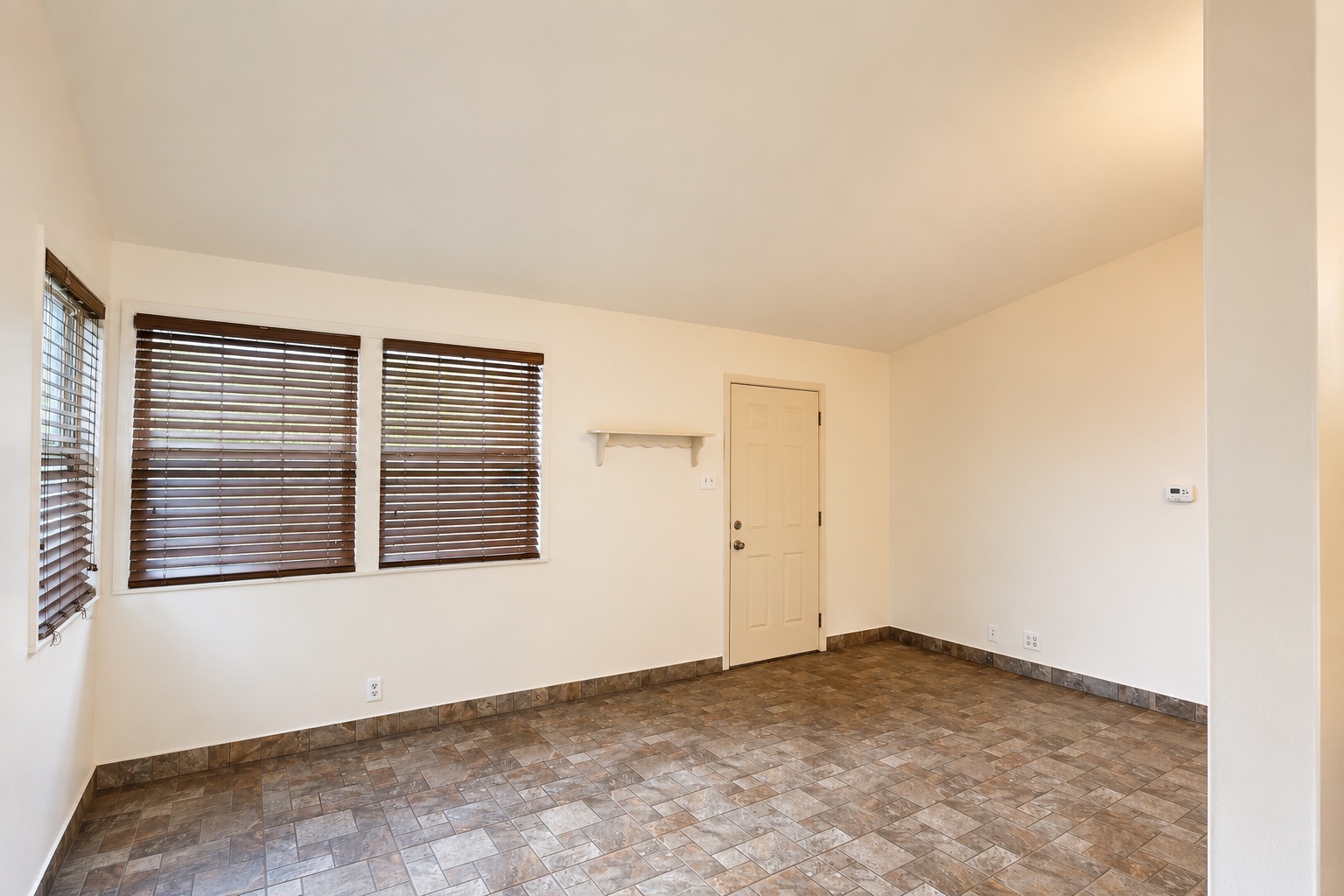 1508 Walnut Street Georgetown, TX 78626 - Photo 17 of 37 A well-lit, versatile room awaits your personal touch with durable tile flooring and natural light.