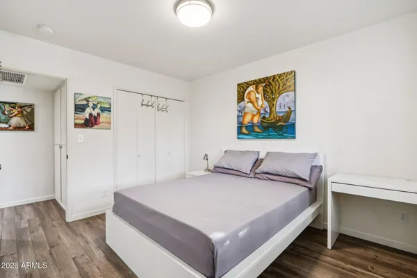 an aerial view of residential houses with outdoor space and street view