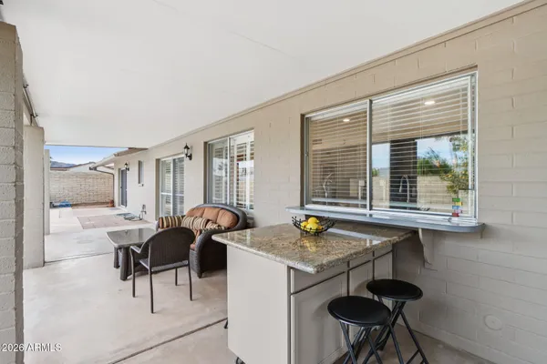 an aerial view of a house with a big yard