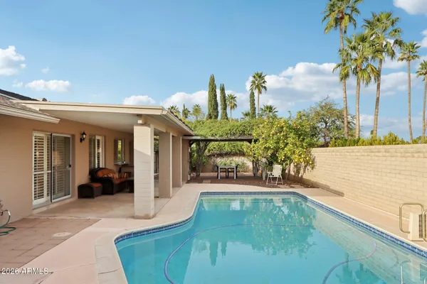a backyard of a house with lots of green space
