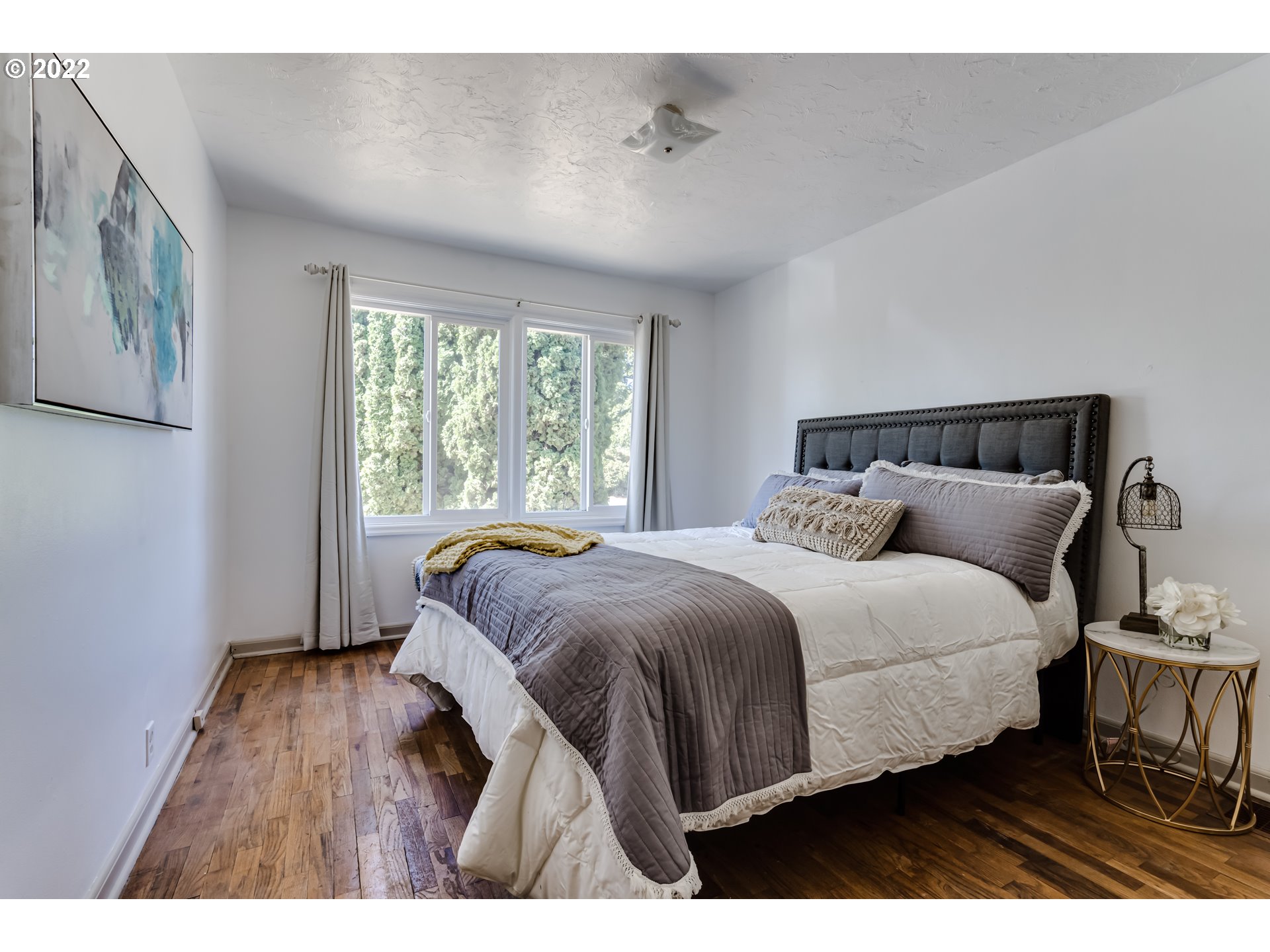 2691 Game Farm Road Springfield, OR 97477 - Photo 14 of 23 a bedroom with a bed and a window
