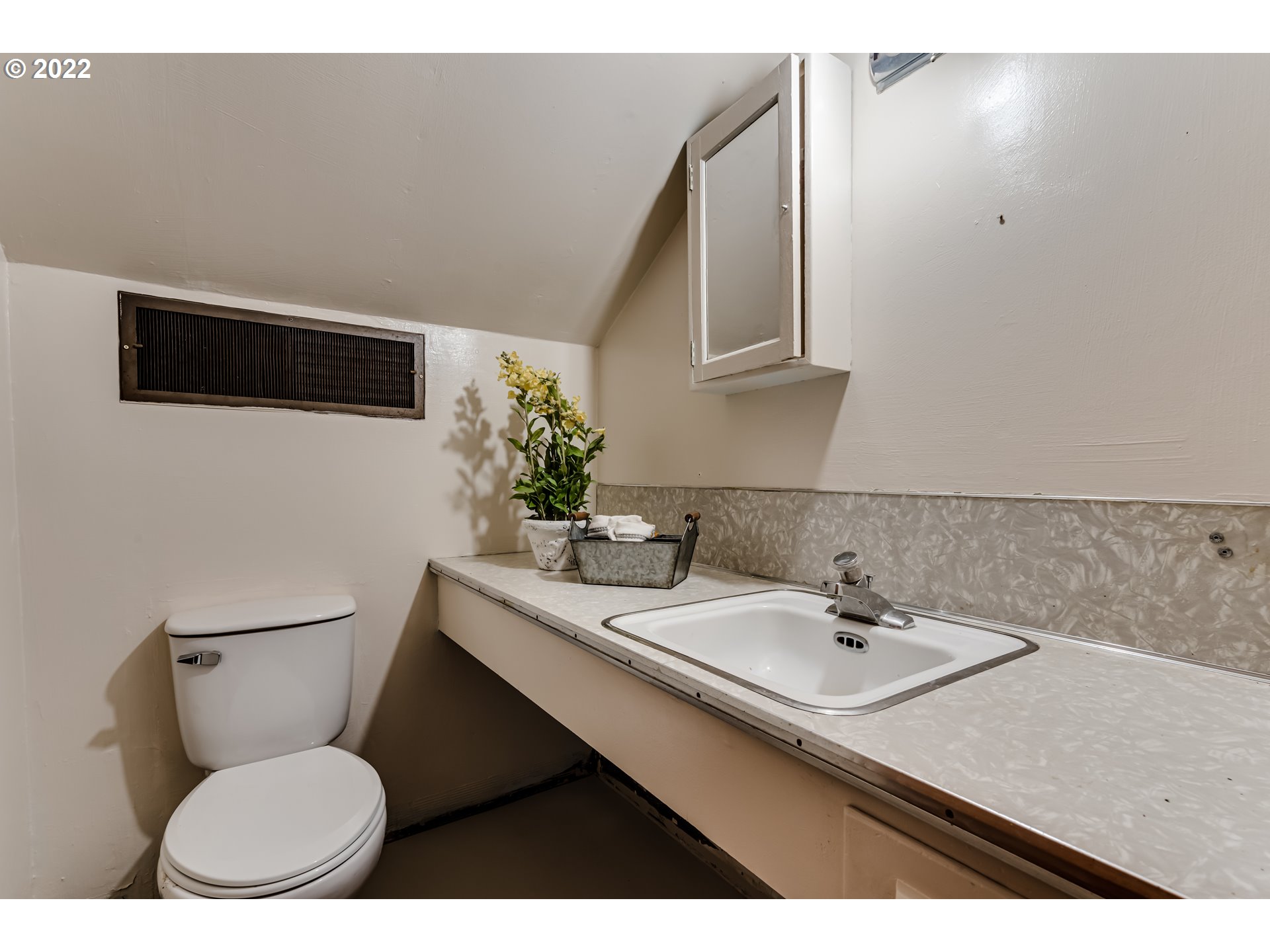 2691 Game Farm Road Springfield, OR 97477 - Photo 20 of 23 a bathroom with a sink a toilet and mirror