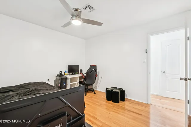 a kitchen with a stove and a refrigerator