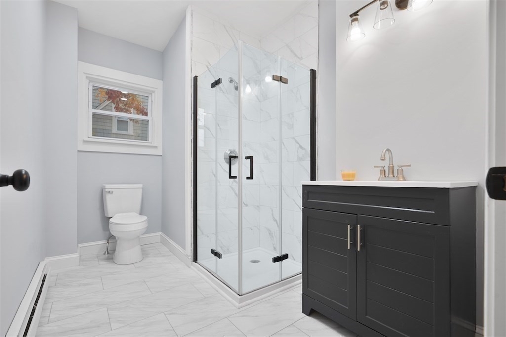 274 Archer Street Fall River, MA 02720 - Photo 16 of 29 a bathroom with a toilet sink and shower
