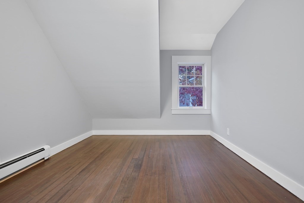274 Archer Street Fall River, MA 02720 - Photo 18 of 29 a view of a room that has wooden floor and window