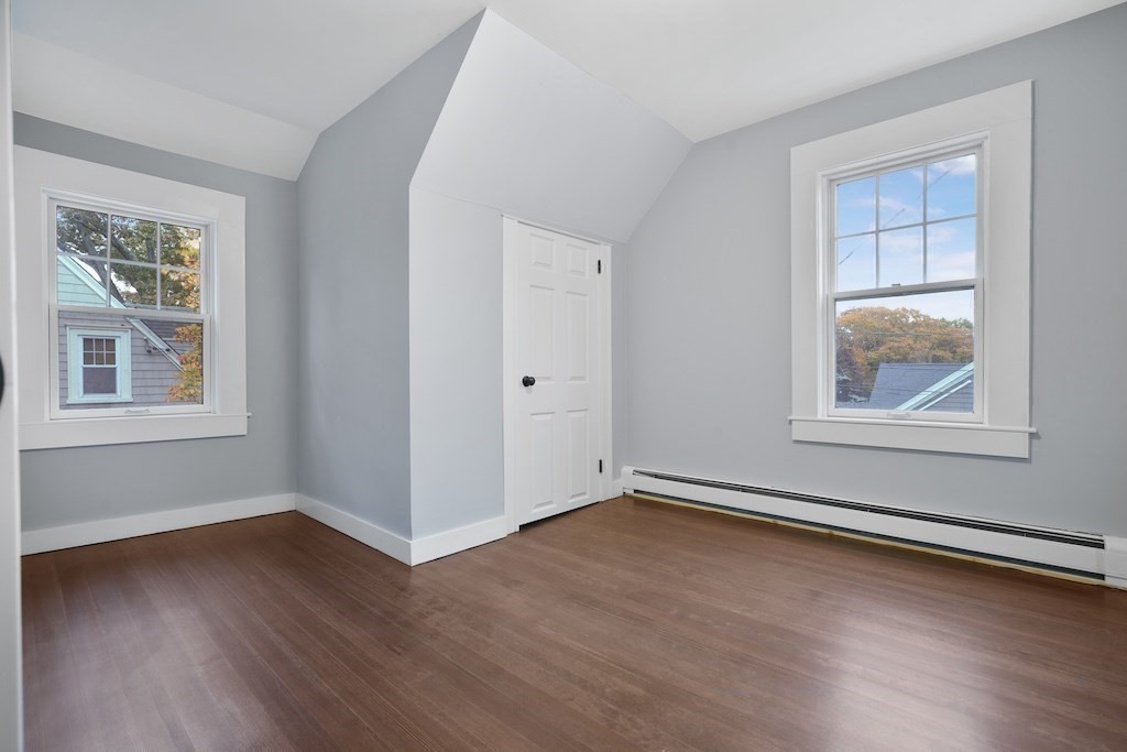 274 Archer Street Fall River, MA 02720 - Photo 23 of 29 a view of an empty room with wooden floor and a window