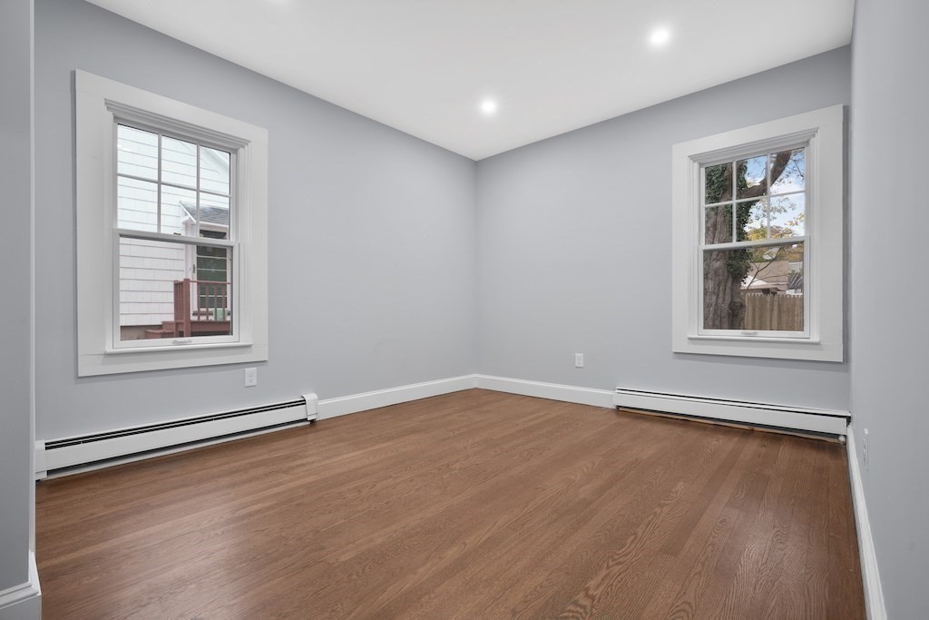 274 Archer Street Fall River, MA 02720 - Photo 25 of 29 an empty room with windows
