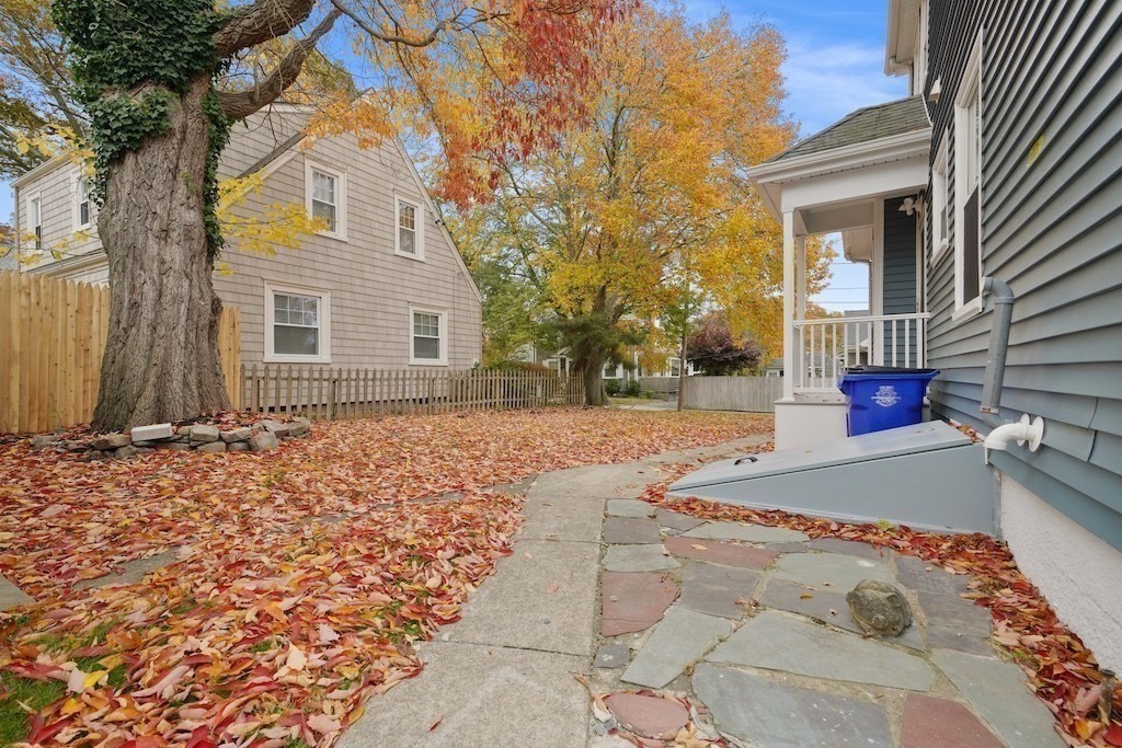 274 Archer Street Fall River, MA 02720 - Photo 5 of 29 a house with trees in front of it