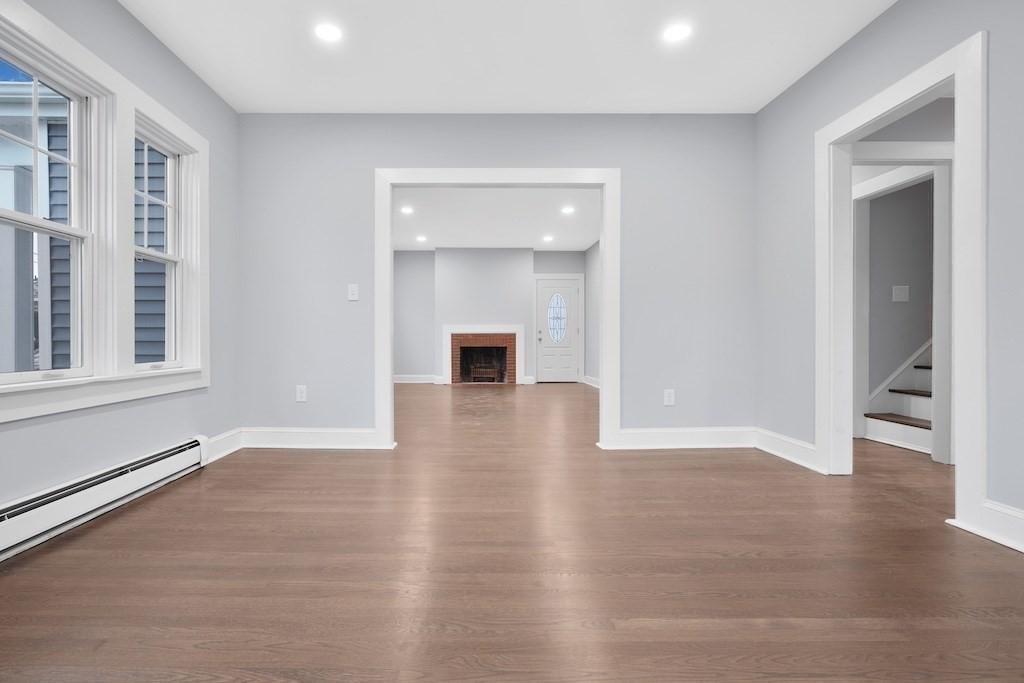 274 Archer Street Fall River, MA 02720 - Photo 10 of 29 wooden floor in an empty room with a window